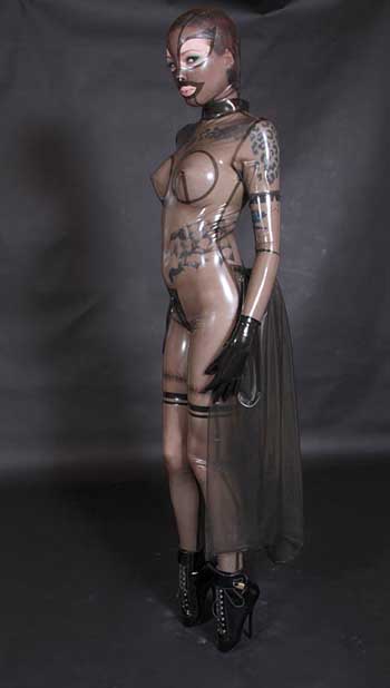 Absolutely stunning semi-transparent Smokey Black Catsuit. With an Inflatable Bustle and attached train for a unique look